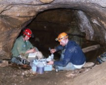 researchers in cave.